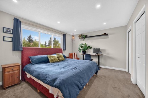 57 Beacham Way Nw, Calgary, AB - Indoor Photo Showing Bedroom