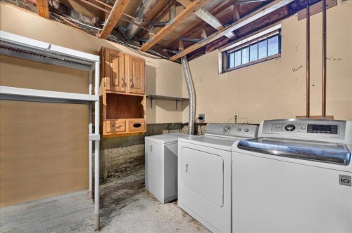 57 Beacham Way Nw, Calgary, AB - Indoor Photo Showing Laundry Room