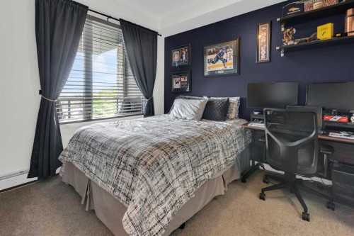 101-30 Shawnee Common Sw, Calgary, AB - Indoor Photo Showing Bedroom