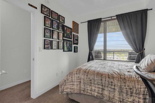 101-30 Shawnee Common Sw, Calgary, AB - Indoor Photo Showing Bedroom