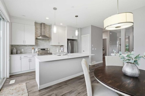 21 Howse Street Ne, Calgary, AB - Indoor Photo Showing Kitchen With Upgraded Kitchen