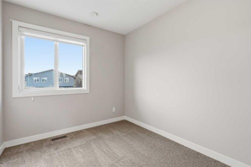 21 Howse Street Ne, Calgary, AB - Indoor Photo Showing Other Room