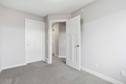 21 Howse Street Ne, Calgary, AB - Indoor Photo Showing Other Room