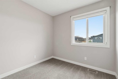21 Howse Street Ne, Calgary, AB - Indoor Photo Showing Other Room