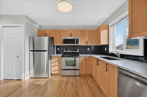 86 Cedarwood Lane Sw, Calgary, AB - Indoor Photo Showing Kitchen