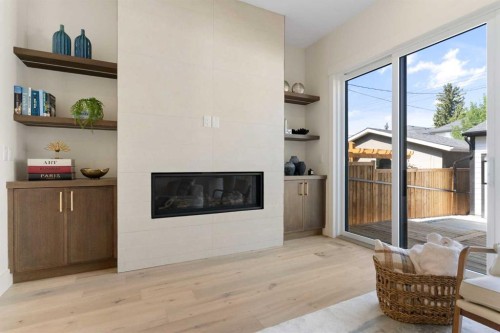 528 52 Avenue Sw, Calgary, AB - Indoor Photo Showing Living Room With Fireplace