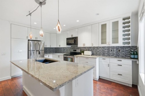 6507 Huntsbay Road Nw, Calgary, AB - Indoor Photo Showing Kitchen With Double Sink With Upgraded Kitchen