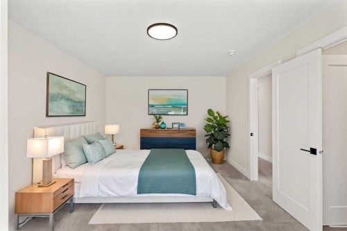 87 Sundown Crescent, Cochrane, AB - Indoor Photo Showing Bedroom