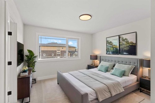 87 Sundown Crescent, Cochrane, AB - Indoor Photo Showing Bedroom