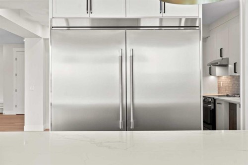 87 Sundown Crescent, Cochrane, AB - Indoor Photo Showing Kitchen