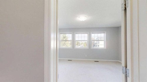 124 Everglen Way Sw, Calgary, AB - Indoor Photo Showing Other Room