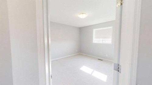 124 Everglen Way Sw, Calgary, AB - Indoor Photo Showing Other Room