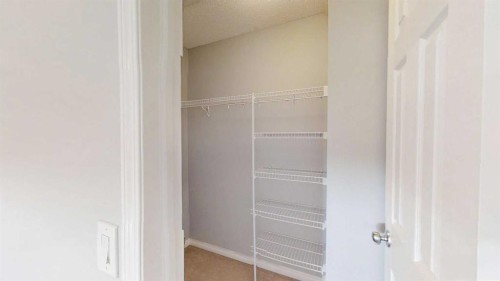 124 Everglen Way Sw, Calgary, AB - Indoor With Storage