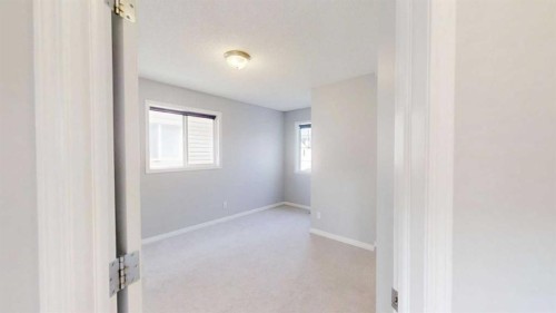 124 Everglen Way Sw, Calgary, AB - Indoor Photo Showing Other Room