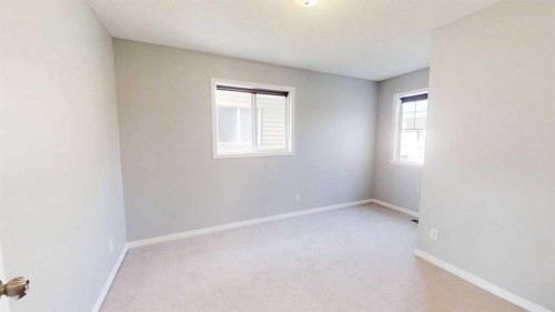 124 Everglen Way Sw, Calgary, AB - Indoor Photo Showing Other Room