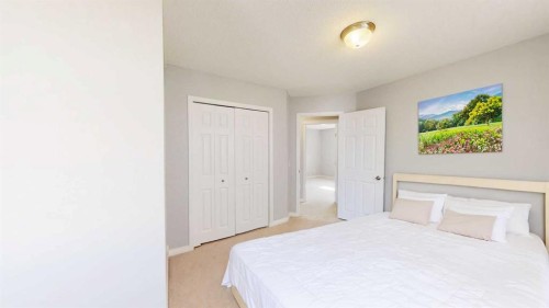 124 Everglen Way Sw, Calgary, AB - Indoor Photo Showing Bedroom