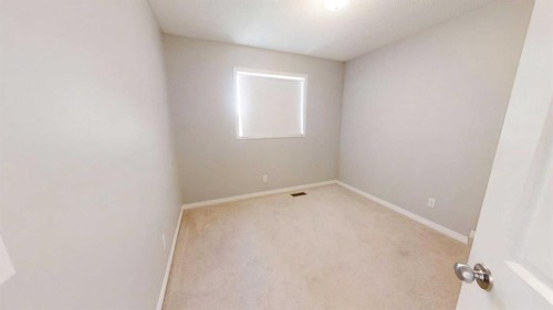 124 Everglen Way Sw, Calgary, AB - Indoor Photo Showing Other Room