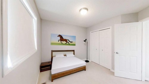 124 Everglen Way Sw, Calgary, AB - Indoor Photo Showing Bedroom