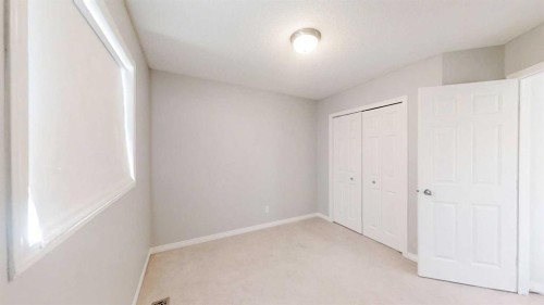 124 Everglen Way Sw, Calgary, AB - Indoor Photo Showing Other Room