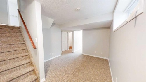 124 Everglen Way Sw, Calgary, AB - Indoor Photo Showing Other Room