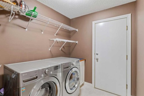215 Rocky Ridge Drive Nw, Calgary, AB - Indoor Photo Showing Laundry Room