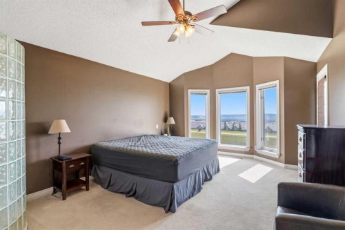 215 Rocky Ridge Drive Nw, Calgary, AB - Indoor Photo Showing Bedroom