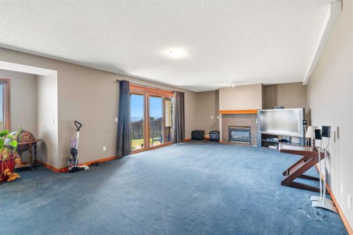 215 Rocky Ridge Drive Nw, Calgary, AB - Indoor With Fireplace