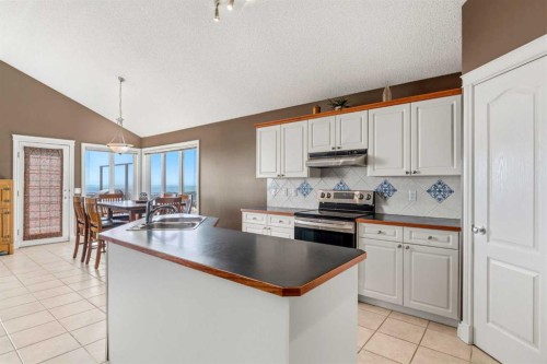 215 Rocky Ridge Drive Nw, Calgary, AB - Indoor Photo Showing Kitchen With Double Sink
