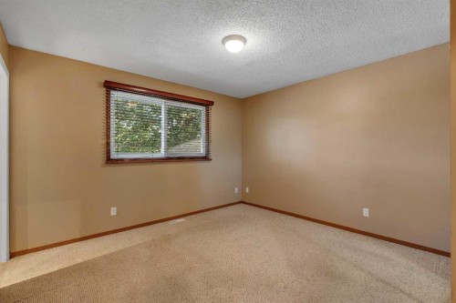 335 Queensland Drive Se, Calgary, AB - Indoor Photo Showing Other Room