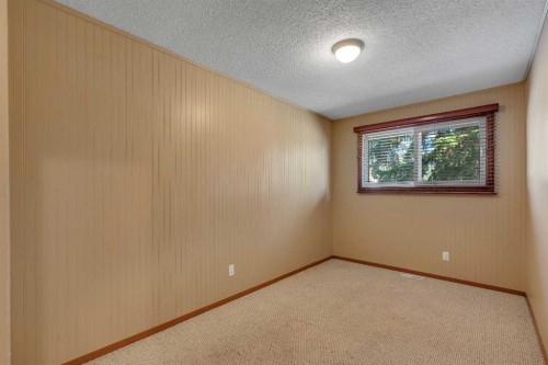 335 Queensland Drive Se, Calgary, AB - Indoor Photo Showing Other Room