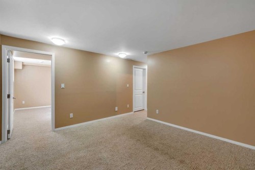 335 Queensland Drive Se, Calgary, AB - Indoor Photo Showing Other Room