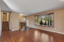 335 Queensland Drive Se, Calgary, AB  - Indoor Photo Showing Living Room 