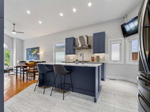 115 Wood Valley Court Sw, Calgary, AB - Indoor Photo Showing Kitchen With Upgraded Kitchen