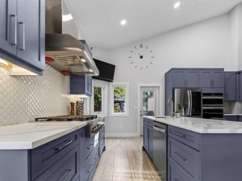 115 Wood Valley Court Sw, Calgary, AB - Indoor Photo Showing Kitchen With Upgraded Kitchen