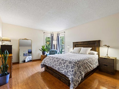 115 Wood Valley Court Sw, Calgary, AB - Indoor Photo Showing Bedroom
