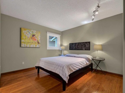 115 Wood Valley Court Sw, Calgary, AB - Indoor Photo Showing Bedroom