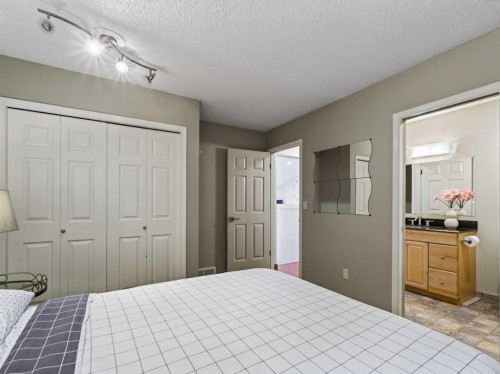 115 Wood Valley Court Sw, Calgary, AB - Indoor Photo Showing Bedroom