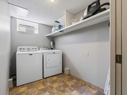 115 Wood Valley Court Sw, Calgary, AB - Indoor Photo Showing Laundry Room