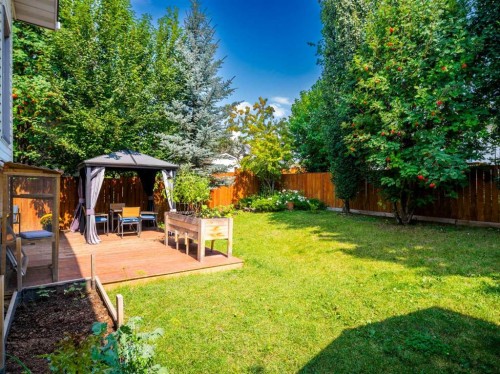 115 Wood Valley Court Sw, Calgary, AB - Outdoor With Deck Patio Veranda With Backyard