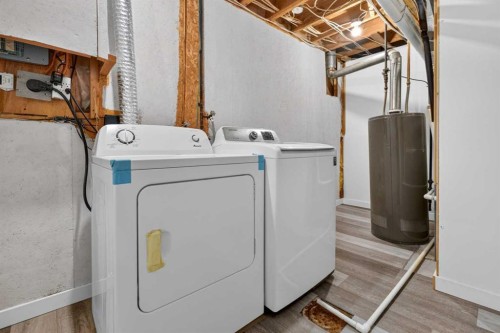 925 Erin Woods Drive Se, Calgary, AB - Indoor Photo Showing Laundry Room