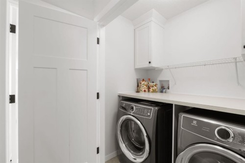 45 Willow Green Way, Cochrane, AB - Indoor Photo Showing Laundry Room