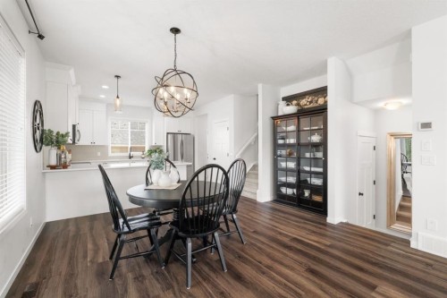 45 Willow Green Way, Cochrane, AB - Indoor Photo Showing Dining Room