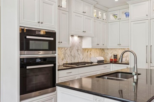 174 Sienna Hills Drive Sw, Calgary, AB - Indoor Photo Showing Kitchen With Double Sink