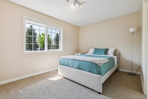 174 Sienna Hills Drive Sw, Calgary, AB - Indoor Photo Showing Bedroom