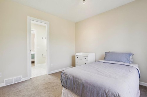 174 Sienna Hills Drive Sw, Calgary, AB - Indoor Photo Showing Bedroom