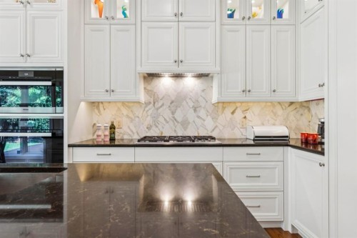 174 Sienna Hills Drive Sw, Calgary, AB - Indoor Photo Showing Kitchen With Upgraded Kitchen