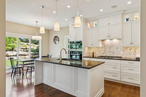 174 Sienna Hills Drive Sw, Calgary, AB - Indoor Photo Showing Kitchen With Upgraded Kitchen