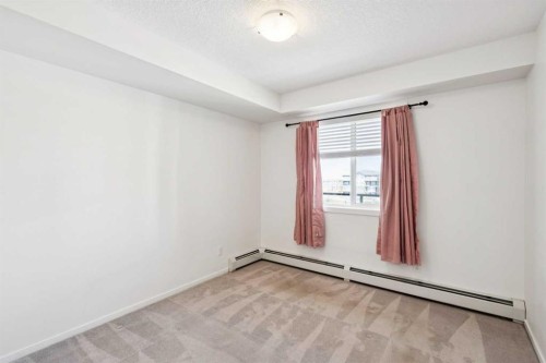 2407-4641 128 Avenue Ne, Calgary, AB - Indoor Photo Showing Other Room