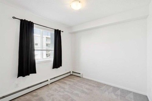 2407-4641 128 Avenue Ne, Calgary, AB - Indoor Photo Showing Other Room