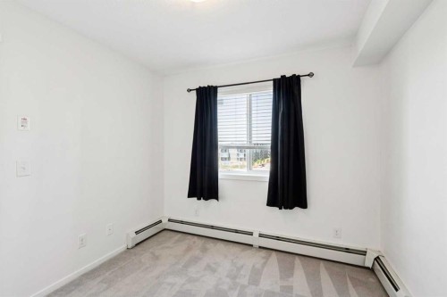 2407-4641 128 Avenue Ne, Calgary, AB - Indoor Photo Showing Other Room